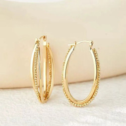 Aros de triple cercle en or massís de 18 quirats Les Accessoires