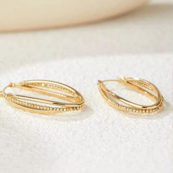 Aros de triple cercle en or massís de 18 quirats Les Accessoires