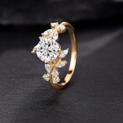 Anell de boda "Nature" amb branques entrellaçades, moissanites i diamants marquesa en or de 14 k