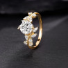Anell de boda "Nature" amb branques entrellaçades, moissanites i diamants marquesa en or de 14 k