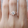 Anell de boda "Nature" amb branques entrellaçades, moissanites i diamants marquesa en or de 14 k